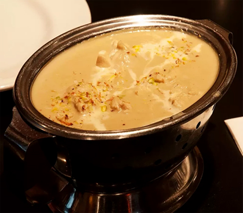 Kheer served in a copper pot