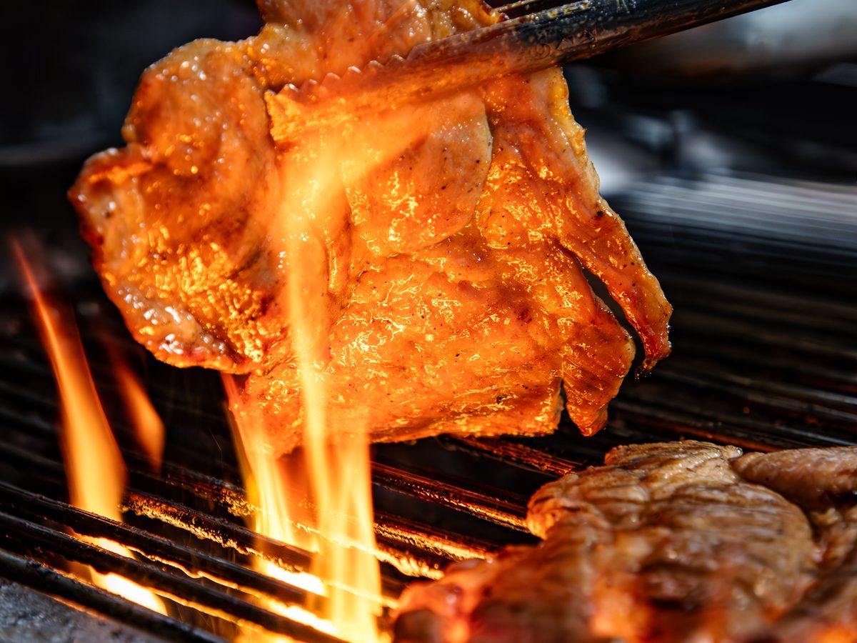 Pork grilled over open flame